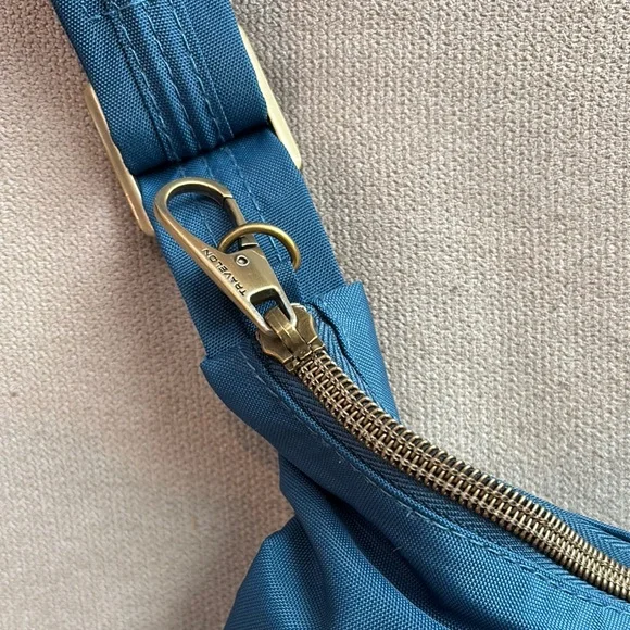 Travelon Blue Crossbody Bag with Adjustable Strap and Soft Fabric - Picture 7 of 9
